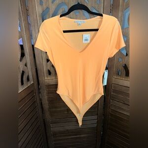 Haute Monde Orange Asymmetrical Bodysuit Top- Size M
